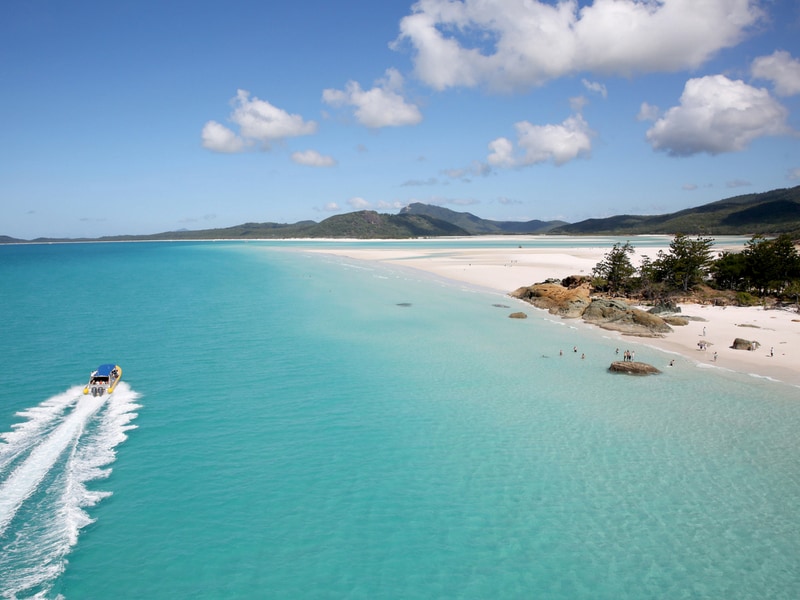 Ocean Rafting vessel passing by Hill Inlet and Whitehaven Beach